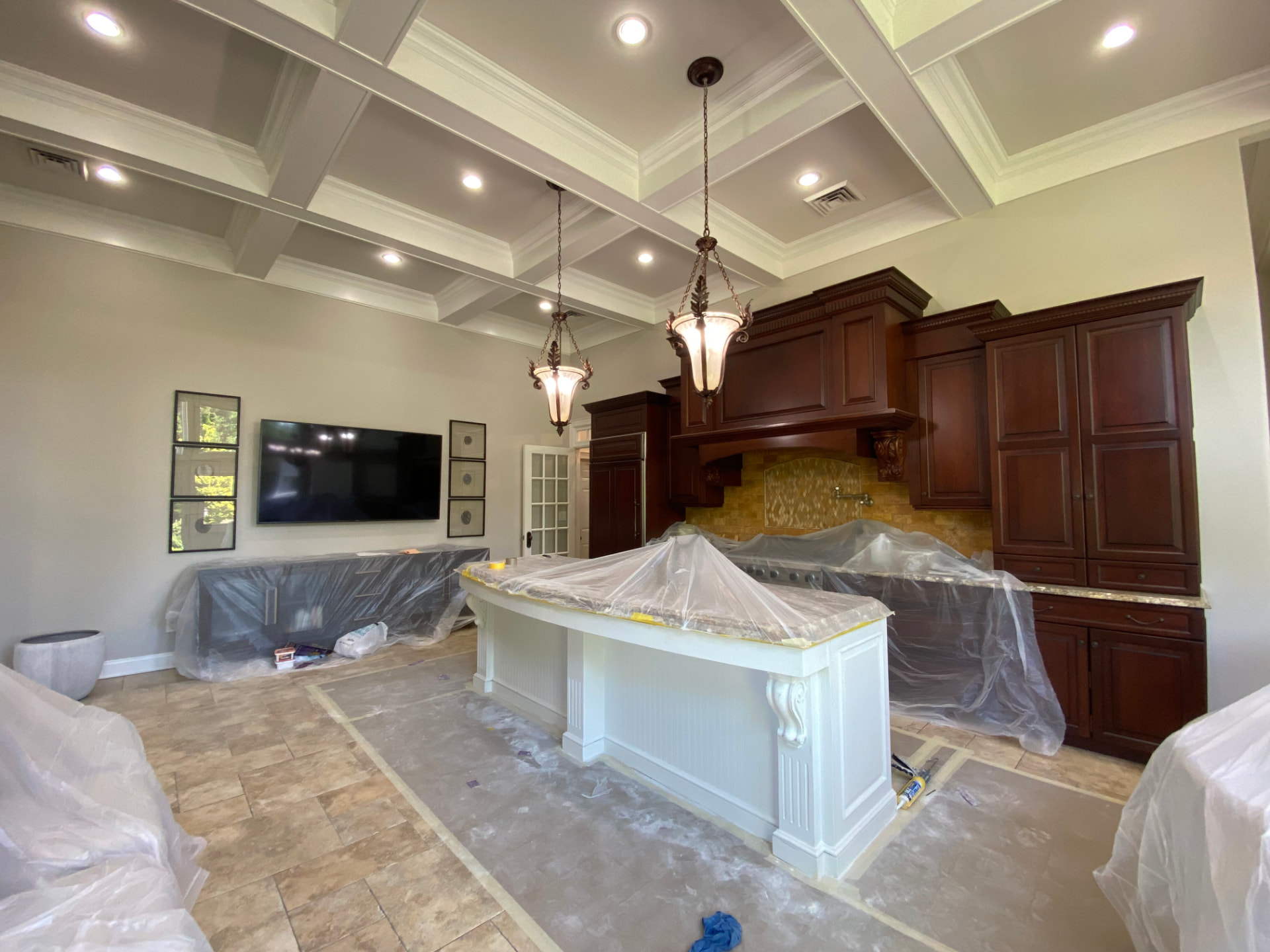 Kitchen island after painting with a fresh white finish